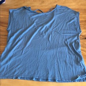 Light blue flowy T-shirt with a strappy back